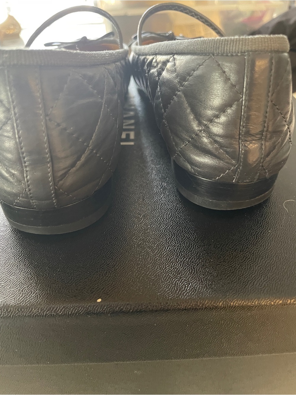 CHANEL Black Quilted Leather Ballet Flats with Bow and CC Emblem - Picture 5 of 7